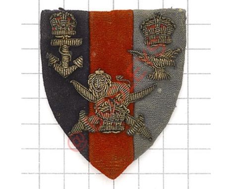 Badge. India Command scarce WW2 formation sign. Felt shield divided vertically Navy blue, scarlet and light blue; each bearin