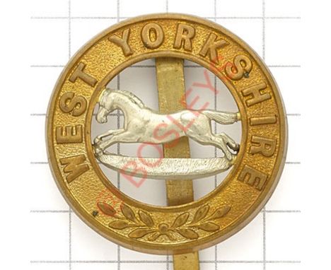 West Yorkshire Regiment post 1881 bi-metal pagri badge. Die-stamped. VGC Long slider 