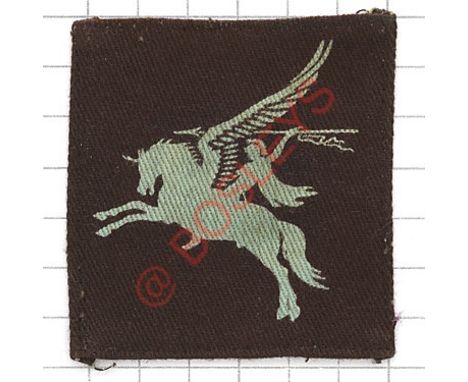Badge. Airborne Forces WW2 printed formation sign. Light blue Bellerophon astride Pegasus on maroon rectangle Designed by Edw