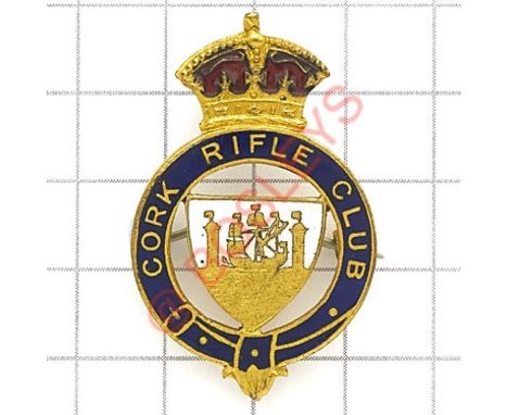 Irish. Cork Rifle Club enamelled lapel \ mufti badge. Crowned blue enamel title strap; shield to voided centre bearing Arms o