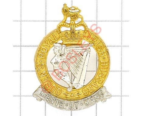 Queen’s Royal Irish Hussars Officer’s cap badge circa 1958. Die-cast 1st pattern in gilt with silvered Maid of Erin Harp and 