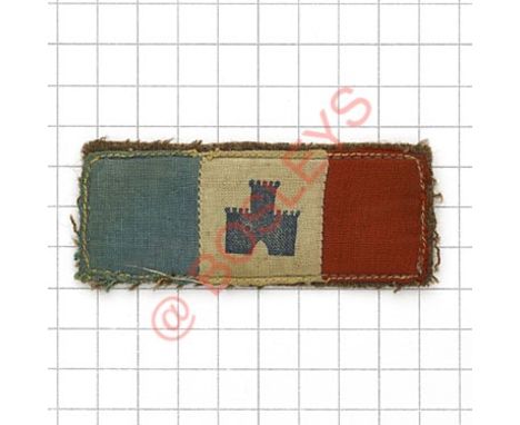 Badge. Friuli Group WW2 formation sign. Green / white / red cotton rectangle, the white portion printed with blue castle gate