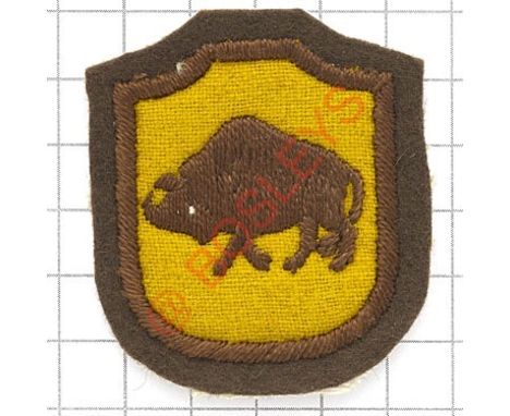 Badge. 5th Kresy Polish Infantry Brigade WW2 formation sign. Brown bison embroidered on a cream brown edged shield. Originall