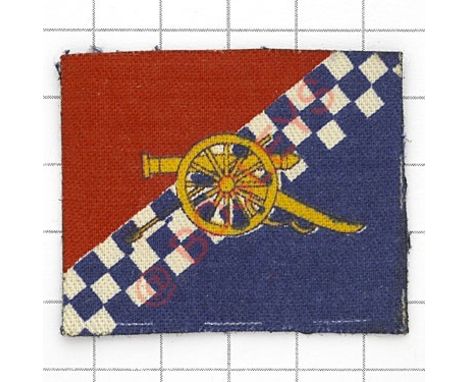 Badge. 85th AGRA (Army Group Royal Artillery) formation sign. Yellow cannon printed on half blue, half red rectangle diagonal