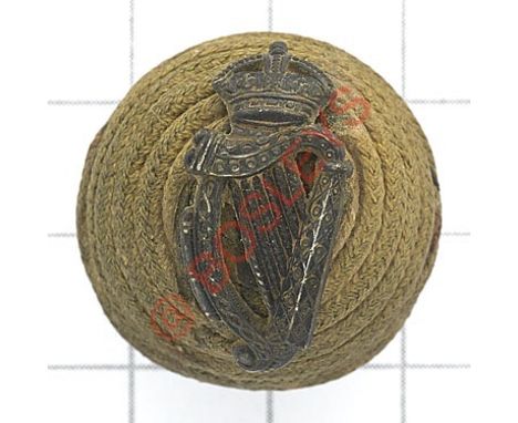 London Irish Rifles post 1901 Officer’s cord boss bearing badge. Green cord boss mounted with silver crowned Harp. Faded othe