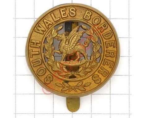 Welsh. South Wales Borderers post 1881 brass pagri badge. Die-stamped. (KK 310) Slight verdigris to reverse VGC Slider 
