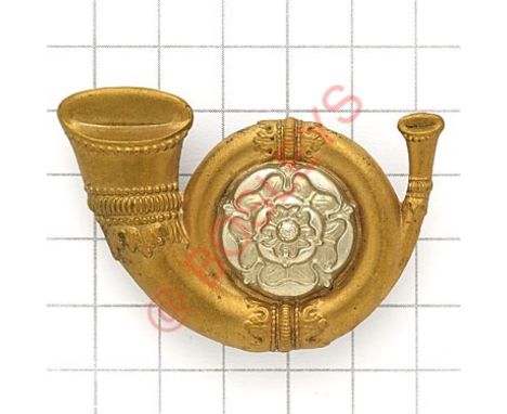 KOYLI OR’s “Smasher hat” badge. Coiled brass bugle horn with applied white metal rose to centre. (KK 669) VGC Loops 