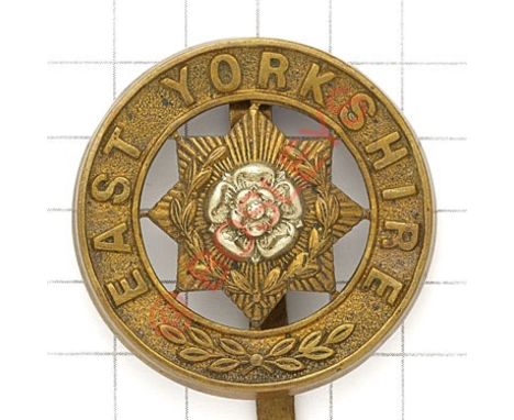 East Yorkshire Regiment post 1881 brass pagri badge. Die-stamped. VGC Long slider 