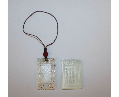 A GOOD 19TH CENTURY CHINESE WHITE JADE PENDANT, carved in shallow relief with fruit to one side and with calligraphy to the r