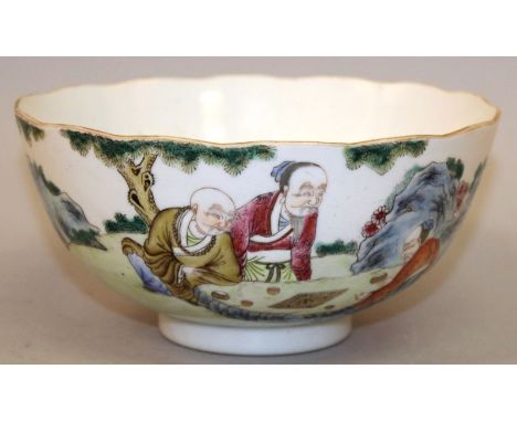 A GOOD 19TH CENTURY CHINESE DAOGUANG MARK & PERIOD FAMILLE ROSE PORCELAIN BOWL, the sides painted beneath a wavy rim with a g