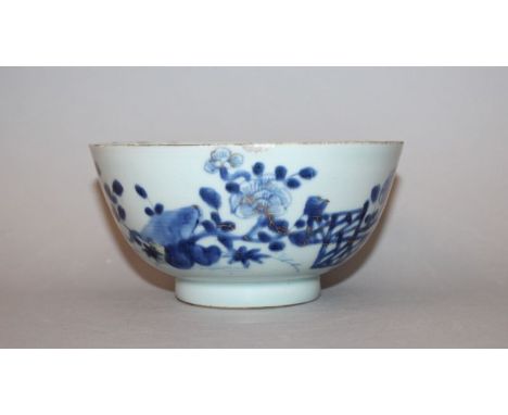 AN EARLY/MID 18TH CENTURY CHINESE BLUE & WHITE PORCELAIN BOWL, painted with a fenced garden scene, 5.8in diameter & 2.9in hig