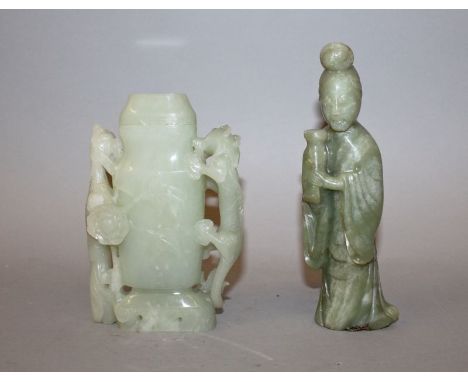 A CHINESE CELADON JADE-LIKE VASE & COVER, the vase supported on one side by a dragon and on the other by a phoenix, 5.7in hig