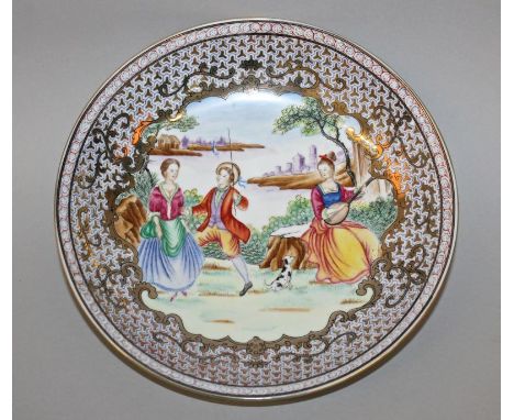 A CHINESE FAMILLE ROSE EUROPEAN-SUBJECT PORCELAIN DISH, the base with a Qianlong seal mark, 8.8in diameter.