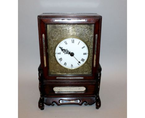 A 19TH/20TH CENTURY CHINESE HARDWOOD CASED CLOCK, with enamel dial, the brass clock face decorated with bats and scrolling le