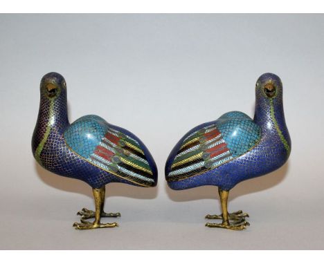 A GOOD MIRROR PAIR OF CHINESE JIAQING PERIOD CLOISONNE BIRD CENSERS, each standing with its head turned to one side and beak 