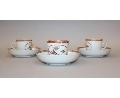 A GROUP OF THREE CHINESE FAMILLE ROSE EXPORT CUPS & SAUCERS, circa 1800, each piece painted with a panel of two birds, each c