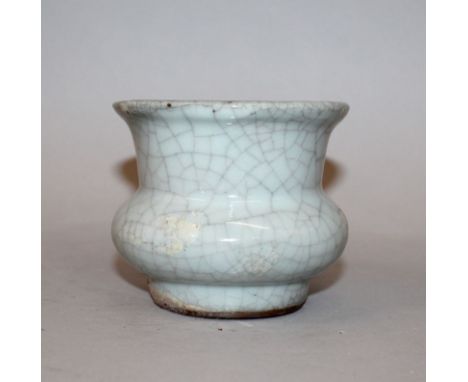 A CHINESE GE TYPE CELADON PORCELAIN VASE, of squat bulbous form, the sides and interior applied with a crackled glaze, 3.6in 