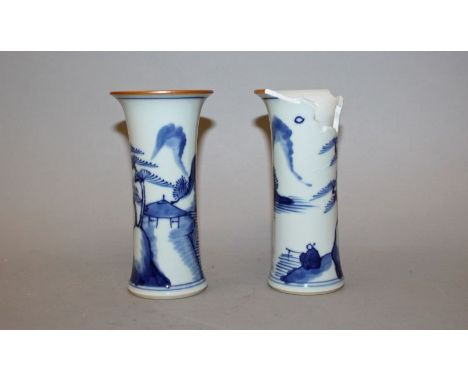 A PAIR OF CHINESE BLUE & WHITE PORCELAIN BEAKER VASES, each with continuous river landscape decoration, 5.5in high.