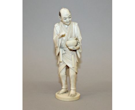  A GOOD QUALITY SIGNED JAPANESE IVORY MEIJI PERIOD FIGURE OF A NIGHT WATCHMAN, bearing a lantern, his feet with sandals, his 