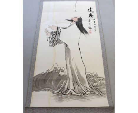 A 20TH CENTURY CHINESE HANGING SCROLL PAINTING ON PAPER, depicting a sage standing beside waves, on a patterned silk mount, t