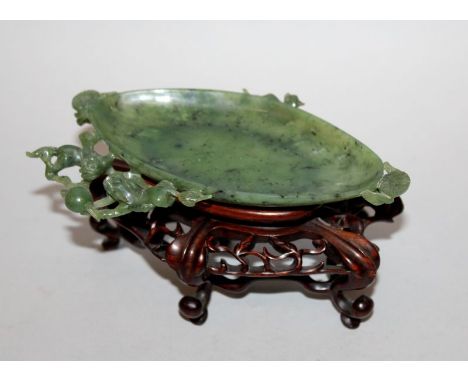 A FINE CHINESE SHALLOW SPINACH GREEN JADE BRUSHWASHER, possibly 18th Century, together with a good quality fitted carved hard