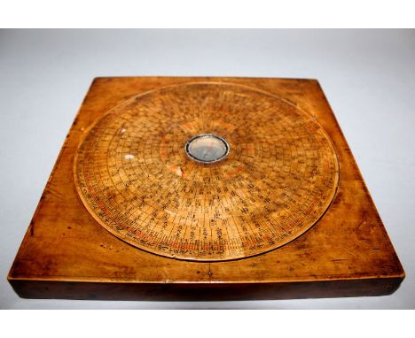 A 19TH/20TH CENTURY CHINESE BOXWOOD ASTRONOMICAL COMPASS & CASE, the circular compass inscribed with an array of numerous cha
