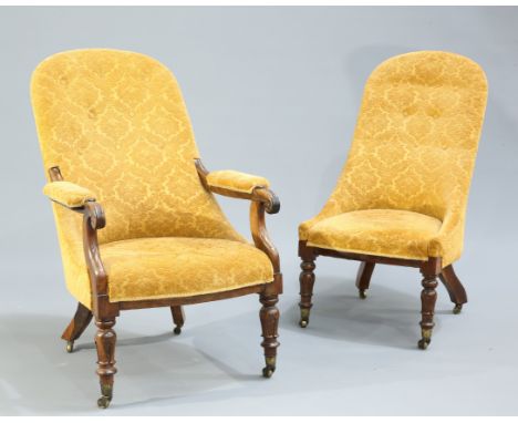 A PAIR OF VICTORIAN ROSEWOOD PARLOUR CHAIRS, the first with scroll carved arms and button back, the second with button back, 