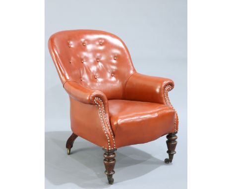A 19TH CENTURY LEATHER UPHOLSTERED MAHOGANY LIBRARY CHAIR BY GILLOWS, with button back and turned baluster fore legs, moving 