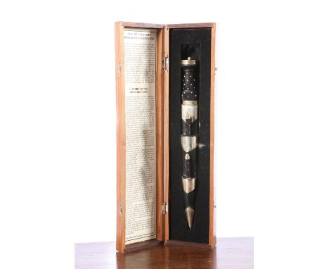 A COPY OF A LATE 19TH CENTURY HIGHLAND OFFICERS' PATTERN DIRK complete with scabbard and smaller knife and fork, the whole co