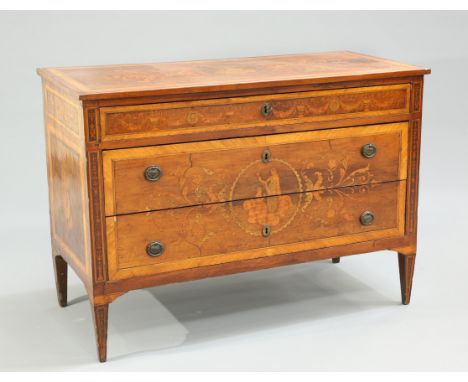 AN 18TH CENTURY CONTINENTAL INLAID WALNUT COMMODE, the rectangular top with floral marquetry inlay and centred by a putto and
