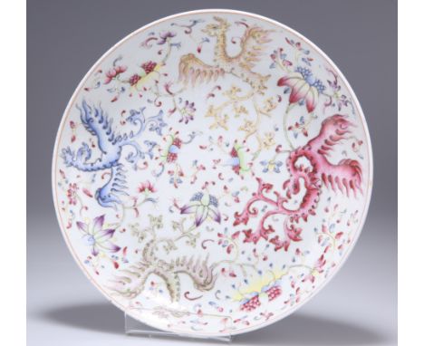 A CHINESE FAMILLE ROSE PORCELAIN DISH,&nbsp;circular, enamel painted with four phoenix and scrolling foliage, bears iron red 