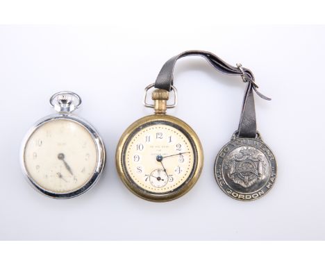 A BRASS CASED POCKET WATCH BEARING THE MOTTO 'DO YOU WEAR THE GORDON HAT', with leather hanging strap and cast medallion with