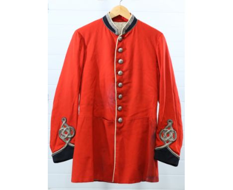 A POST 1880 RIFLE VOLUNTEER OFFICERS' PATTERN SCARLET TUNIC, with black facings and silver lace. Bearing a full complement of