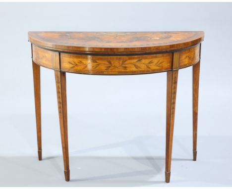 A GEORGE III PAINTED SATINWOOD DEMILUNE FOLDOVER CARD TABLE, the top painted with floral swags within a border of coiled ribb