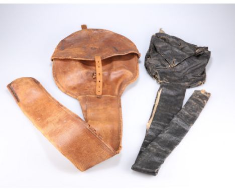 A PIGSKIN SWORD COVER, bearing the initials AMCD and another, in oilskin and much older (2)&nbsp;&nbsp;

The absence of a Con