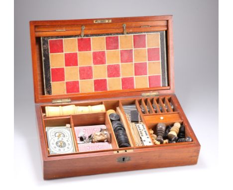 A LATE VICTORIAN GAMES COMPENDIUM, the mahogany box with brass fittings, opening to reveal fitted compartments for game piece