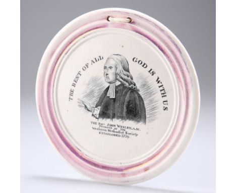 A VICTORIAN COMMEMORATIVE POTTERY PLAQUE, circular with pink lustre, printed with a portrait of John Wesley and the motto 'TH