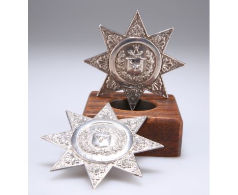 TWO HM SILVER SASH STARS OF THE ANCIENT ORDER OF FORESTERS, Birmingham 1859 and 1869. 8cm in diameter (2)The absence of a Con