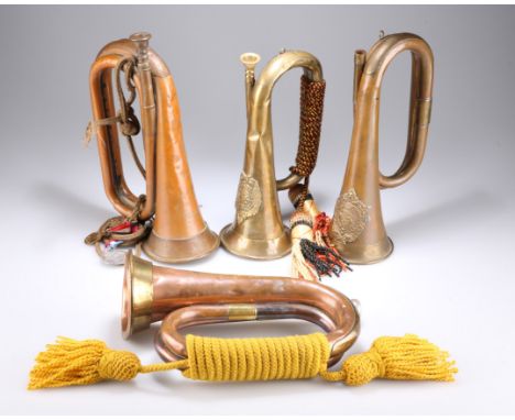A COPPER MILITARY BUGLE WITH BRASS FITTINGS ENGRAVED 'PRESENTED TO ? Bn. THE GORDON HIGHLANDERS BY R W PETRIE MC', complete w