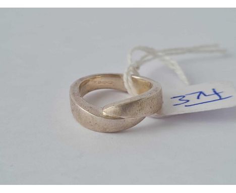 A boxed silver “Fossil” ring