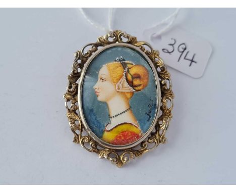 A silver gilt oval portrait brooch