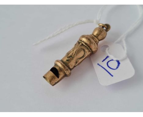 A vintage gilt whistle