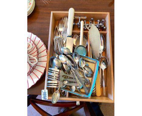 Wooden tray of cutlery including knife rests and silver handled toasting fork