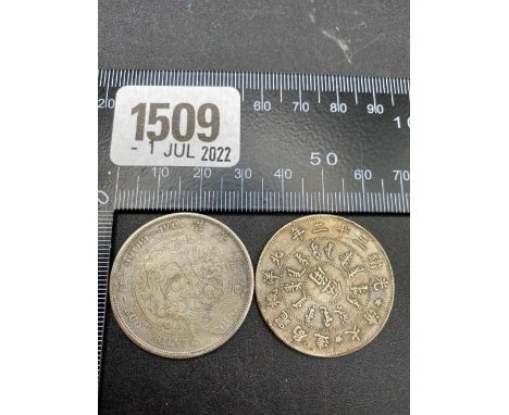 Two Chinese silver coins