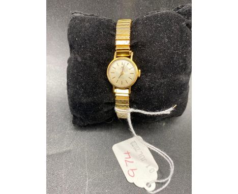 A ladies rolled gold TISSOT wrist watch