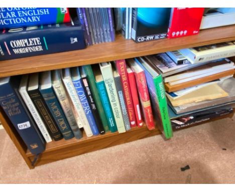 A shelf of hardback books