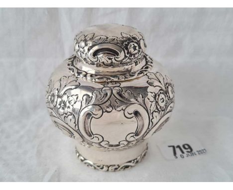 Victorian embossed tea caddy with a pull off cover. 3.25” high. Birmingham 1888. By G N, R H. 148gms