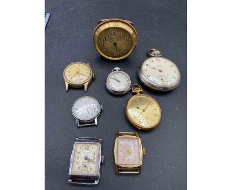 A bag of assorted vintage watches