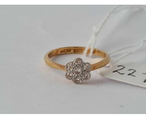 A Edwardian diamond daisy cluster ring 18ct gold size K – 2 gms