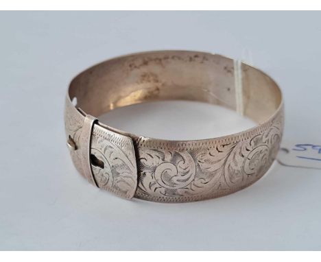 A wide silver bangle – 24 gms